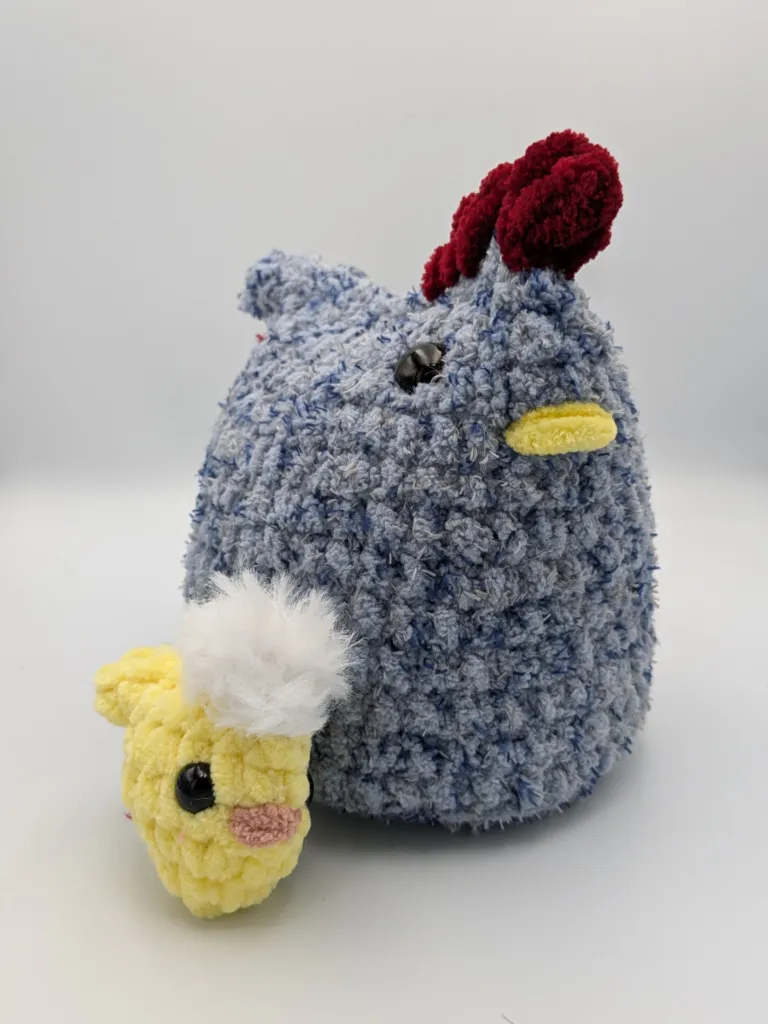 Handmade blue crocheted chicken